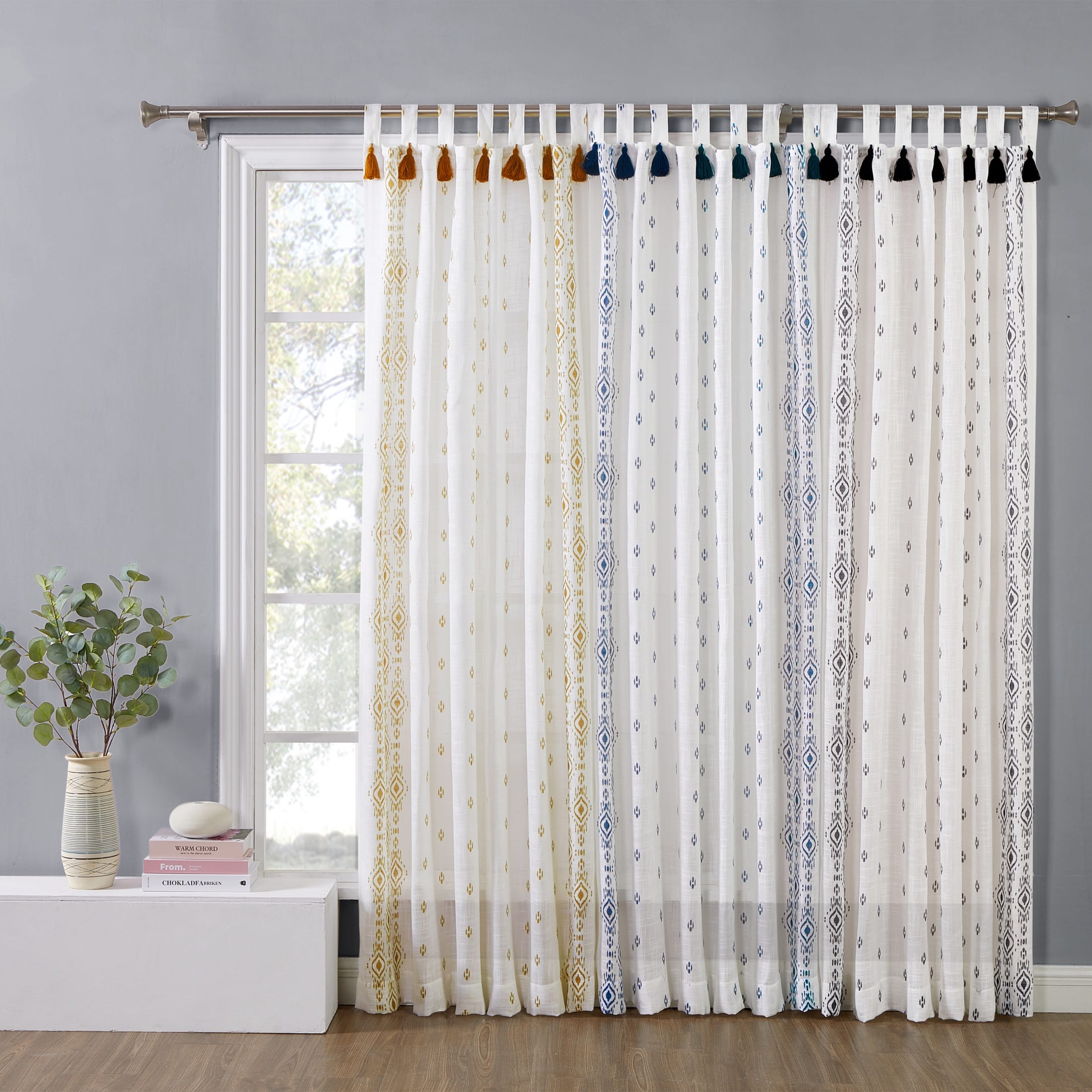 Coordinated curtain panels photographed across multiple colors and patterns